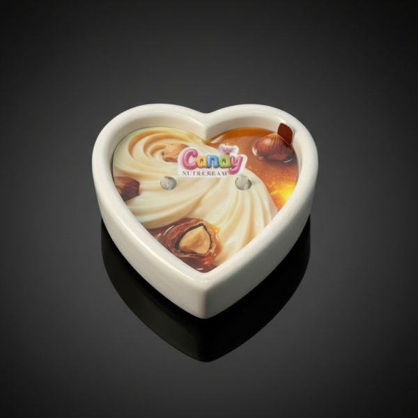 Масажна свічка з ароматом горіхового крему Candy Nut Cream у формі серця, 70 мл C384823 фото